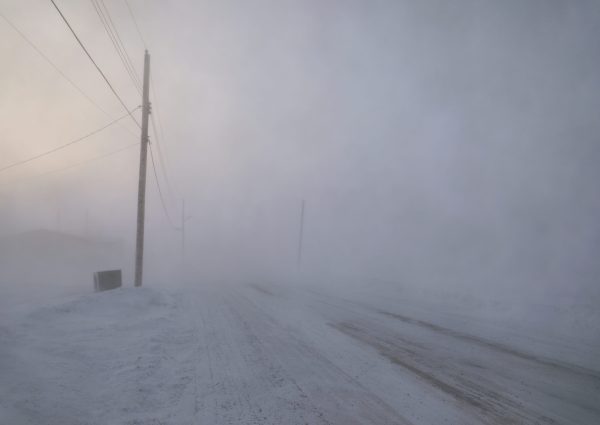 Road,Disappearing,Under,Blizzard,Conditions,In,Arviat,,Nunavut,Canada,In