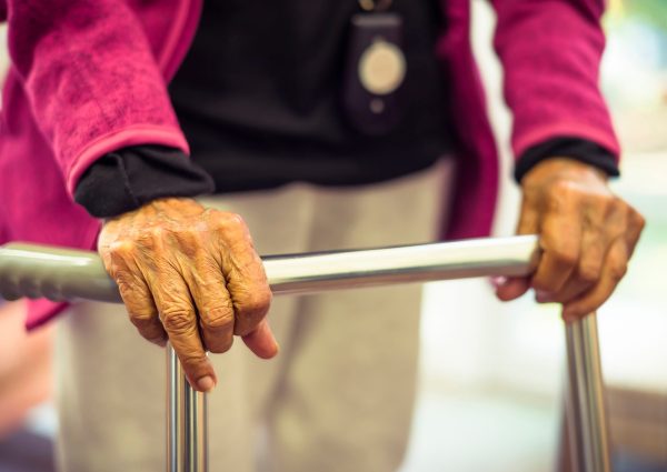 Old,Elderly,Indian,Asian,Woman,Walking,With,A,Zimmer,Frame